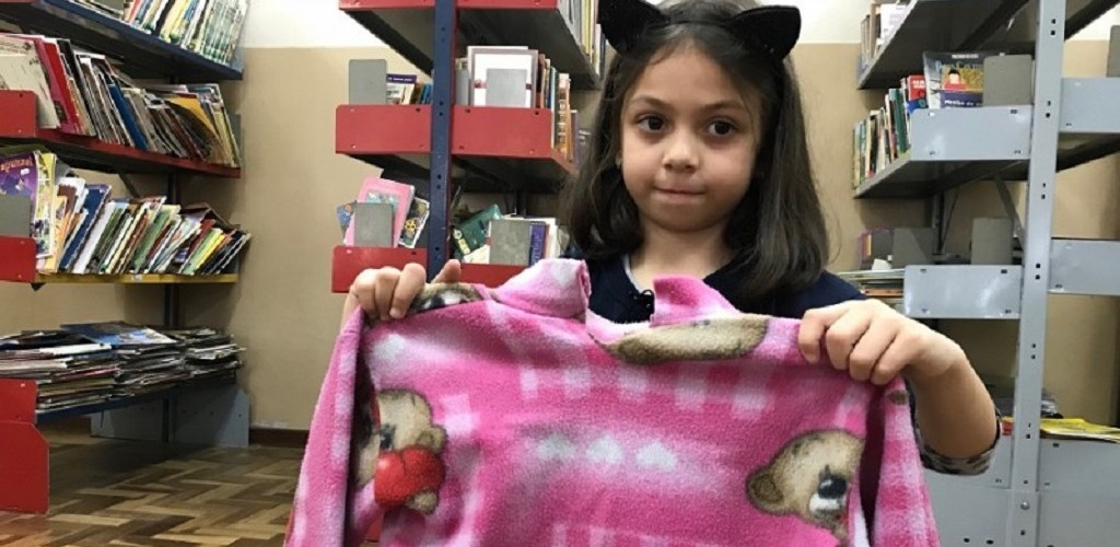 Escolas estimulam doações de roupas infantis para a Campanha do Agasalho